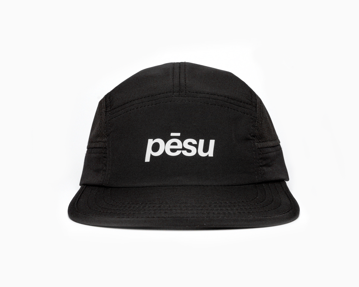 Pēsu black lightweight performance 8 panel cap with breathable mesh panels, quick-dry fabric, moisture-absorbing sweatband and minimalist design for sport and lifestyle. White pēsu box logo on frontpanel.