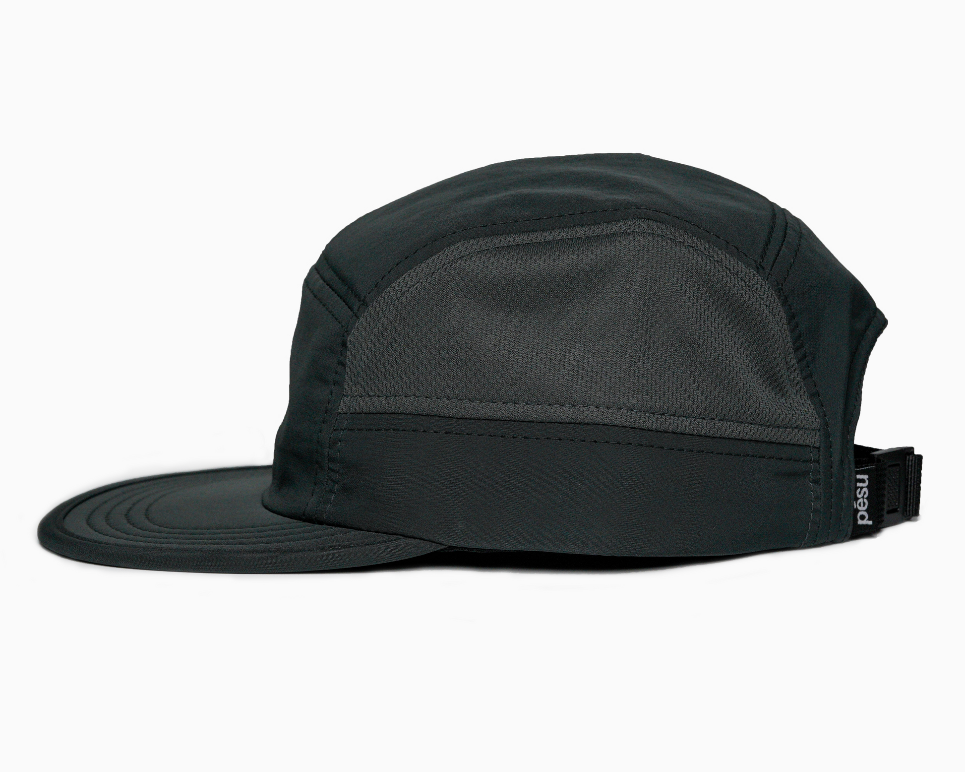 Pēsu charcoal lightweight performance 8 panel cap with breathable mesh panels, quick-dry fabric, moisture-absorbing sweatband and minimalist design for sport and lifestyle. Logo detail on black back buckle. 