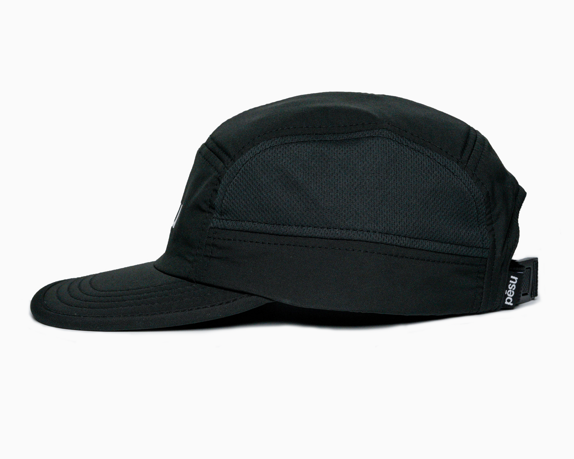 Pēsu black lightweight performance 8 panel cap with breathable mesh panels, quick-dry fabric, moisture-absorbing sweatband and minimalist design for sport and lifestyle. White pēsu box logo on frontpanel. Logo detail on black back buckle. 